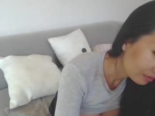 Provocative Asian Leilee Webcam Teasing on the Sofa: Free xxx video vid 0e